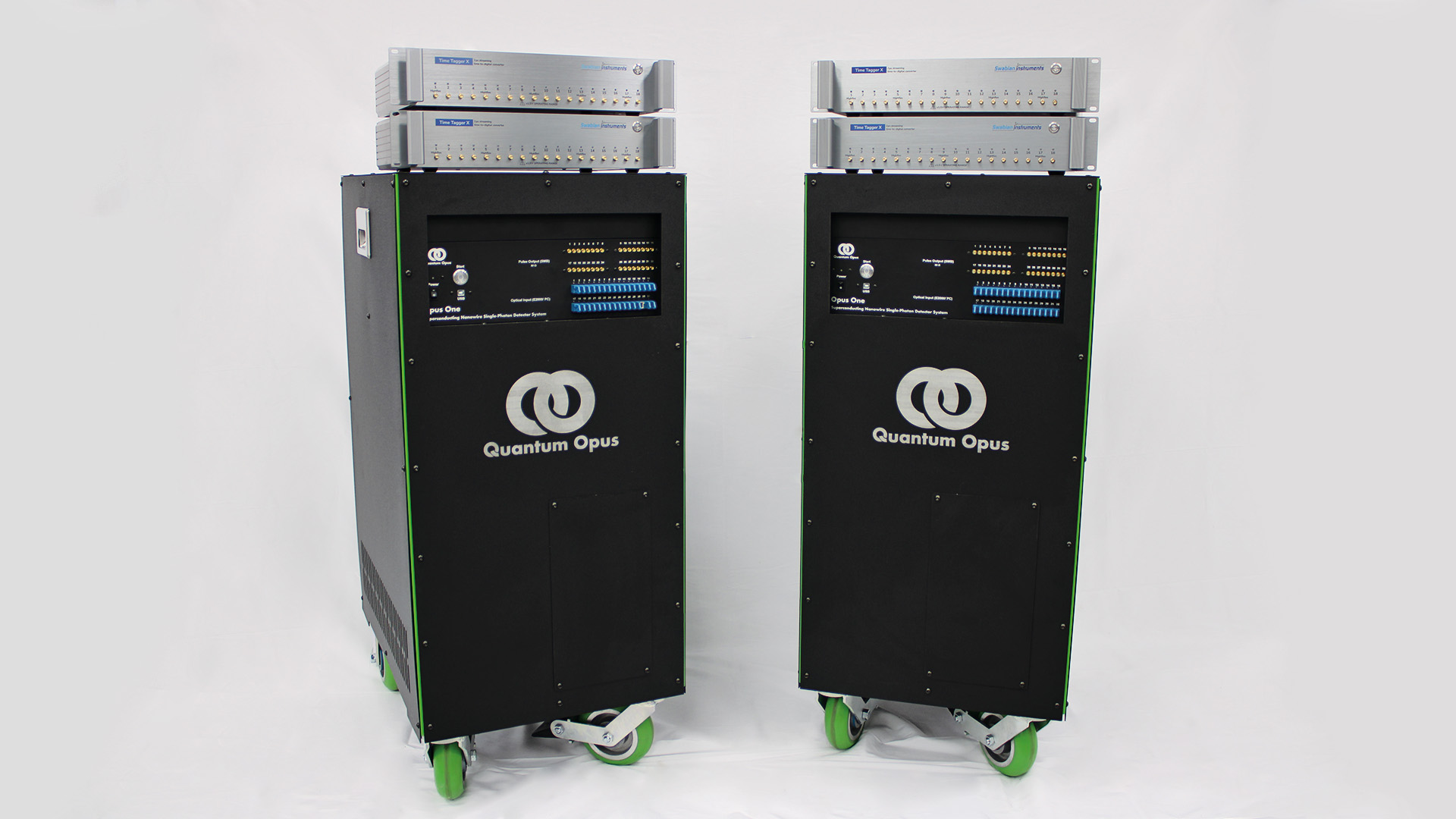 Two 32-channel Quantum Opus Portable superconducting nanowire single-photon detector (SNSPD) systems with two Swabian Instruments’ Time Tagger X Time-to-Digital Converters (TDC) placed on top.